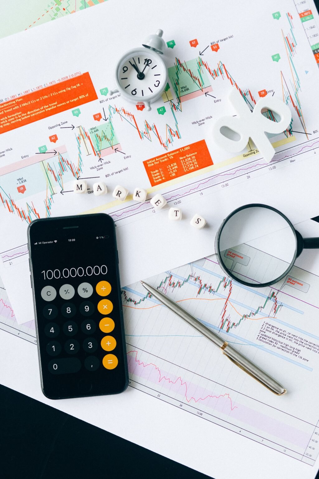 Beginner learning Forex trading using market charts on a laptop.
